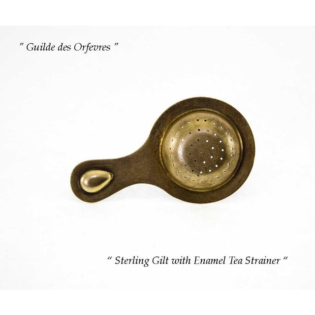 "A Sterling Gilt Tea Strainer with Multicolor Enameled Cloisonné. Pattern : Enameled Cloisonné - Size : 4.5 in. Weight:...
