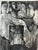 Wonderfully moody black-and-white intaglio etching print featuring surreal, stylized organic human-like figures and an...