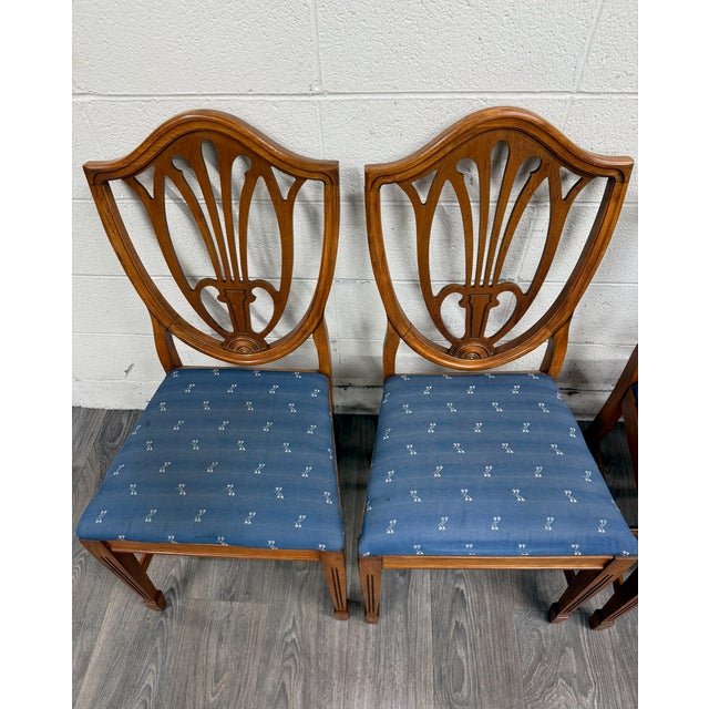 This is a gorgeous set of five vintage Duncan Phyfe or Hepplewhite style Shield Back dining side chairs. Feature...