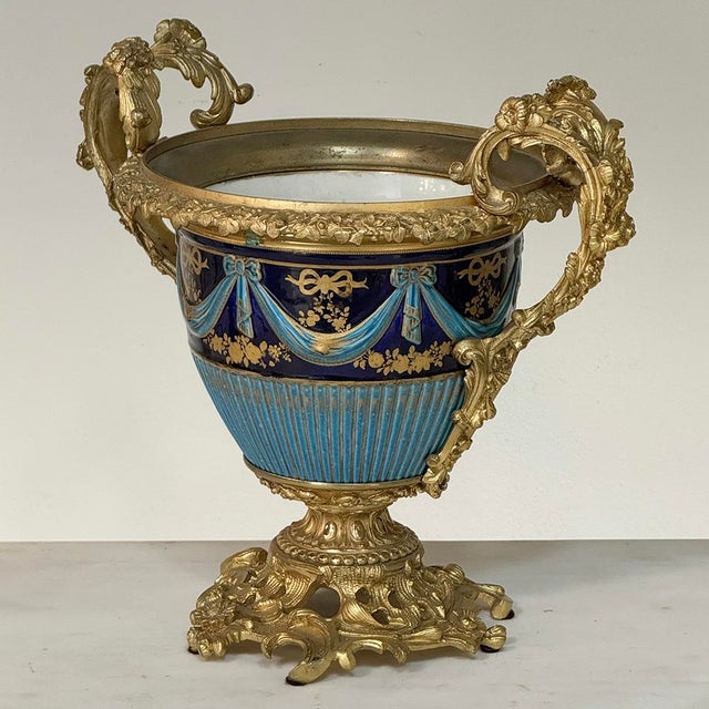 An exceptional 19th century French porcelain vase executed in the Sèvres style, reflecting the celebrated aesthetic that...