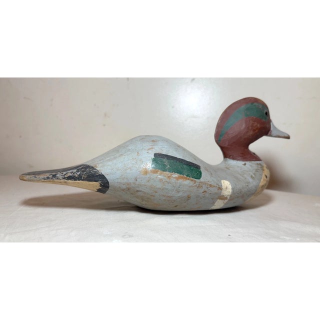 Up for sale is a wonderful antique hand carved wooden Folk Art green-winged teal duck decoy sculpture. It is beautifully...