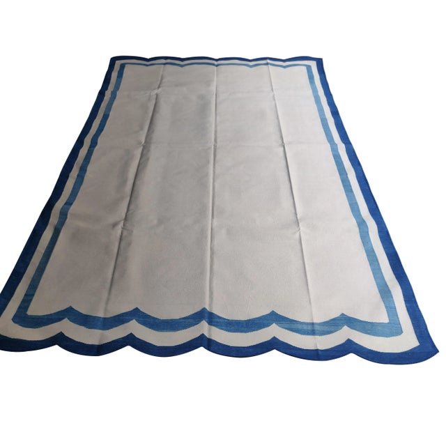 Cotton Scalloped Edge Reversible Rug. Scalloping runs along 8' sides. These special flat-weave dhurries are hand-woven...