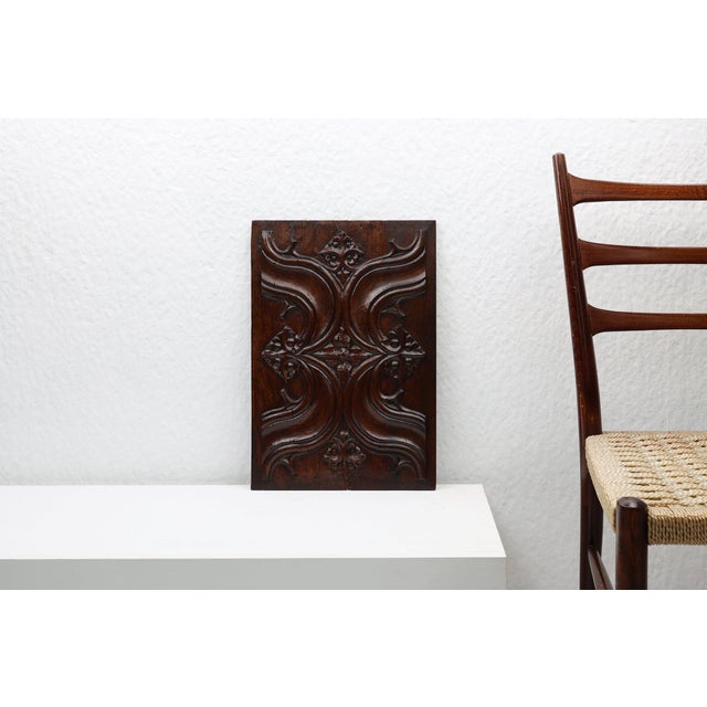 A striking relic of Northern European Gothic artistry, this carved oak panel from Belgium, circa 1500s, embodies the...