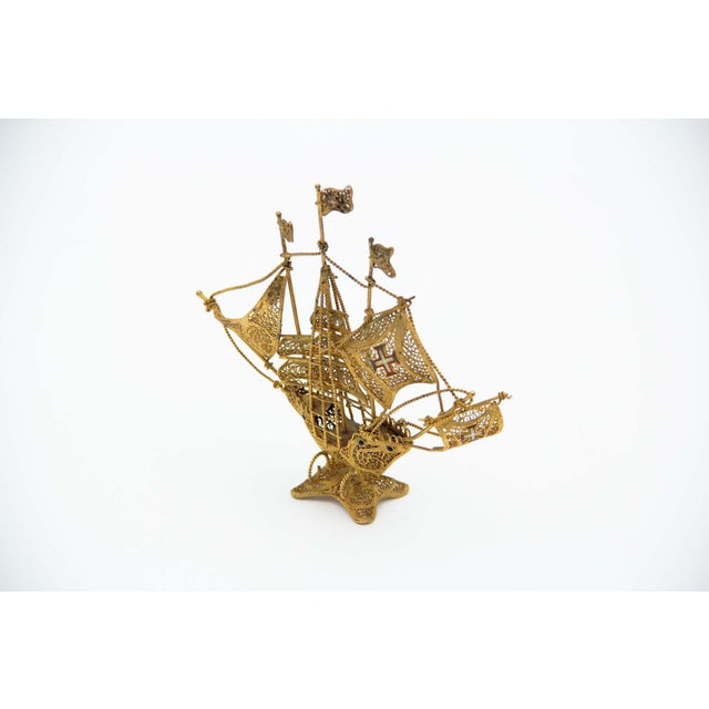 Silver-Gilt Miniature Caravel, in Very Good conditions. Designed 1920 to 1949 This piece has an attribution mark, I am...