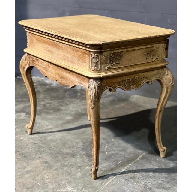 A delightful Solid Oak Side or Lamp Table, having a single drawer to the front, lovely carved decoration and elegant legs....