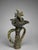 This unusual sculptural glazed earthenware object is best cataloged as an antique French épi de faîtage, or roof-ridge...