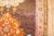 3rd quarter of the 20th Century Turkish Kars rug with 2 floral medallions on a brown color ground Measures: 7' x 9'4''