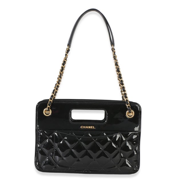 Item #: 154816 Interior Material: Fabric;Leather Dimensions: 10.25 x 7 x 2.5 in Features Interior: Two zip pockets. Two...