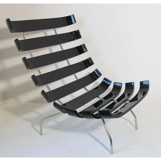 Martin Eisler Carlo Hauner Costela style lounge chair in black lacquer. Originally designed by Martin Eisler in 1952 this...