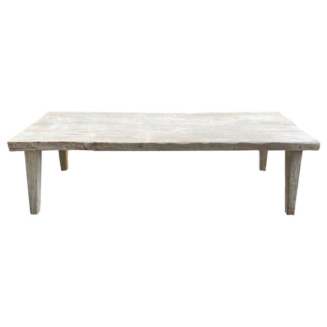 Beautiful Minimalist bench or coffee table, bleached with a light white wash finish. The top is made from a single two...