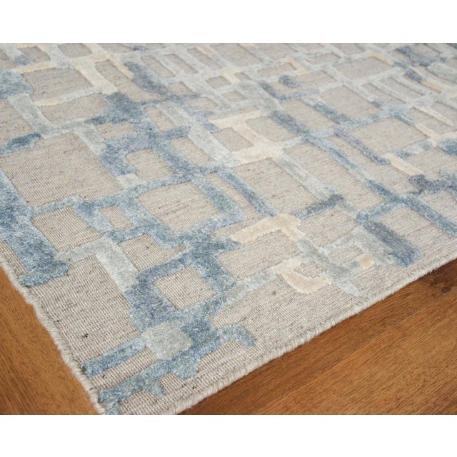 The Vista rug reimagines contemporary design with its dramatic high low patterns and exciting color palette. An allover...