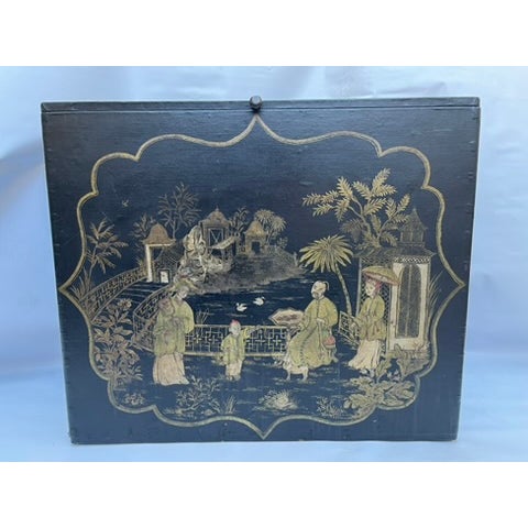 A single rectangle shape wood trunk or coffee table featuring applique chinoiserie or japanned style decoration including...