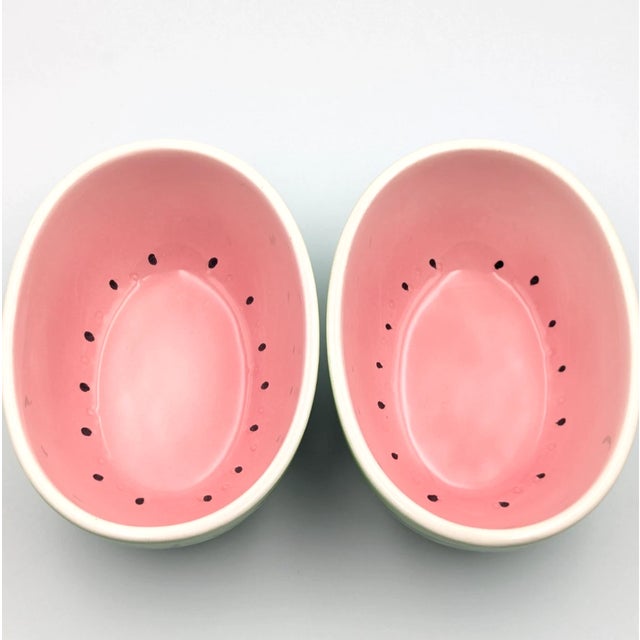 Add a slice of nostalgic summer charm to your table with this vintage set of 2 oval watermelon ceramic serving bowls from...