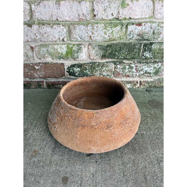 Terra Cotta Pot, India. This simple but highly textured piece of pottery features an array of burnt oranges and terra...