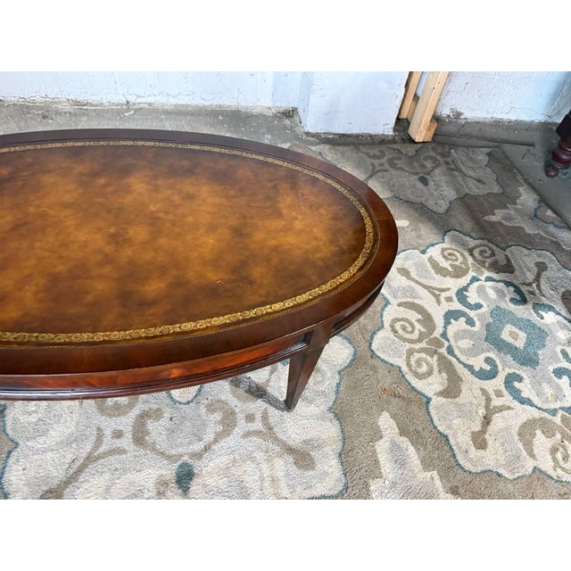 Wood Vintage Regency Style Oval Leather Top Flame Mahogany Coffee Table on Casters. By Weiman. For Sale - Image 7 of 11