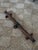 Antique horse yoke repurposed as a coat and hat rack with shaker style pegs. A great piece for a mudroom or entry in a...