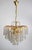 This luxurious waterfall chandelier features a gold-plated socket and is adorned with numerous Swarovski crystals. 3 E14...