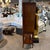 A stunning Thomasville “Bogart Chateau” two-door dry bar, showcasing a sophisticated Art Deco-inspired design with richly...