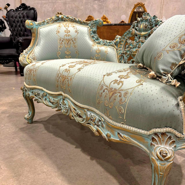 Introducing a stunning blend of elegance and sophistication, this settee features a beautiful sky blue-green color that...