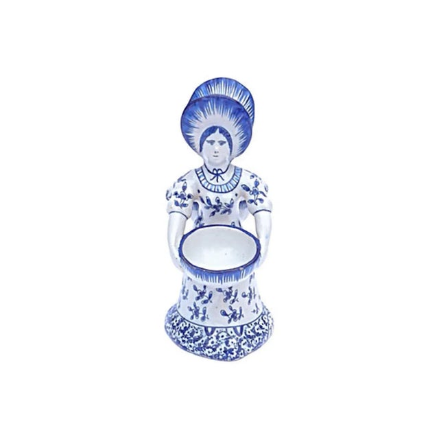 Antique Delft double woman figurine depicts two fronts of a woman facing opposite each other holding a bowl. Marked on the...