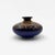 with its low, generously rounded, almost pebble-like silhouette, this captivating ceramic vase plays as much on volume as...