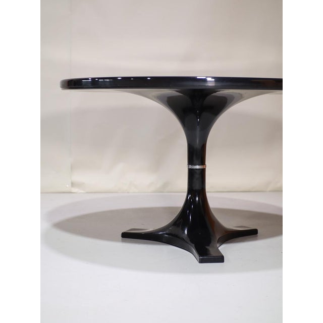 Black round dining table (model 4997/4993) designed in 1964 by Ignazio Gardella and Anna Castelli Ferrieri for Kartell,...