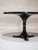 Black round dining table (model 4997/4993) designed in 1964 by Ignazio Gardella and Anna Castelli Ferrieri for Kartell,...