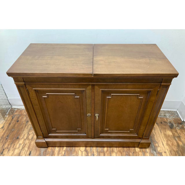 Classic lines on this piece with finished back and smooth moving, caster wheels. Nice condition with just a few marks:...