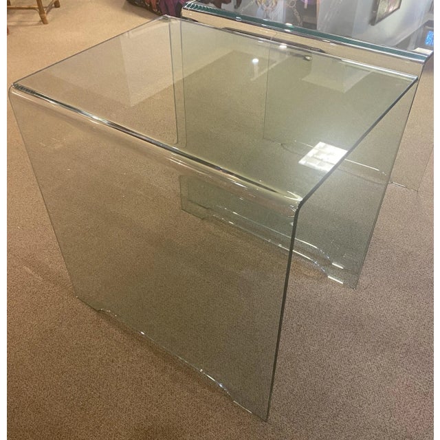 Pair of oversized glass waterfall end tables. Glass is 1/2" with pencil polished edge. Great high quality tables in great...