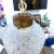A beautiful cut glass in a Geometric raised pattern. Brass fittings. Measurements are top of brass to bottom of globe. I...