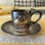Antique demitasse cup and saucer with spoon. Cup Marked 800. Includes a spoon that is labeled made in England EPNS. Gold...