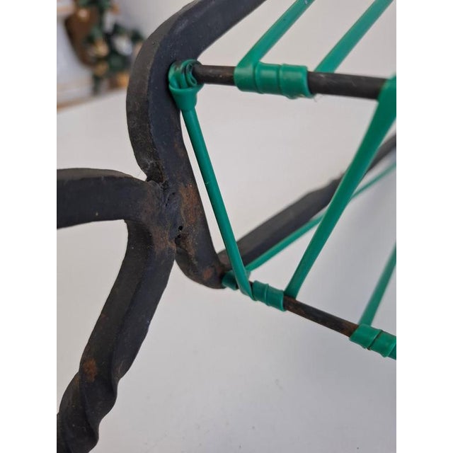 A distinctive vintage Czechoslovakian magazine and newspaper rack dating to circa 1960, showcasing a highly unusual...
