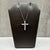This natural diamond cross necklace is crafted in 14kt white gold and features a timeless cross pendant set with 0.64...