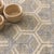 For a modern angle, stylized motifs of interlocking honeycombs in blue and natural hues float on a natural jute ground....