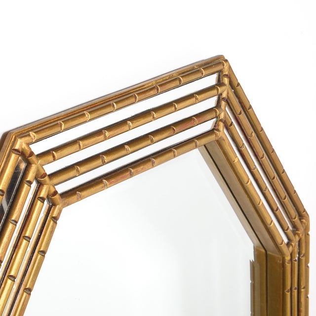 This striking Mid-Century Modernist mirror from circa 1970 showcases an octagonal shape with tiered, segmented detailing...