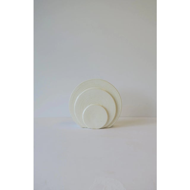 A very beautiful white to off-white round Japanese pottery vase, late Modern/Art Deco period, circa early-20th century...
