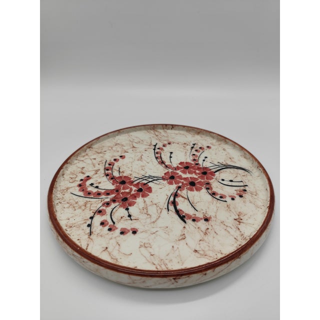 Plate 22 cm diameter Vase 12.5 cm high, 12 cm wide, 6 cm deep 3 cups 5 cm high Minimal markings present (numbers not...