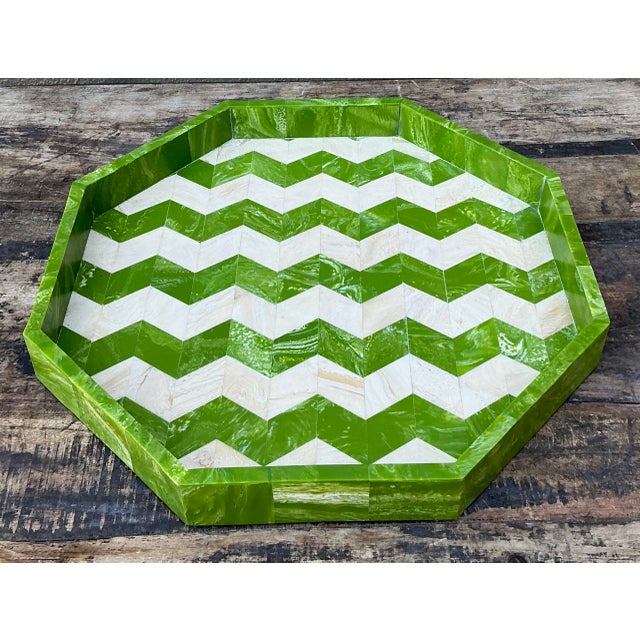 Elevate your bar cart or coffee table with this striking vintage octagonal tray, a sophisticated blend of Hollywood...