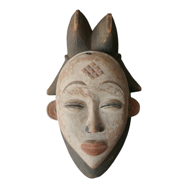 Early 20th Century Punu-Lumbo Tribal Mask For Sale