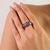 This unique 2.23 carat ruby & emerald dome band ring for women is crafted in 925 sterling silver. Featuring round and...