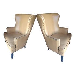 A Pair of Elegant Mid-Century Leather Butterfly Wingback Chairs by Williams-Sonoma. For Sale