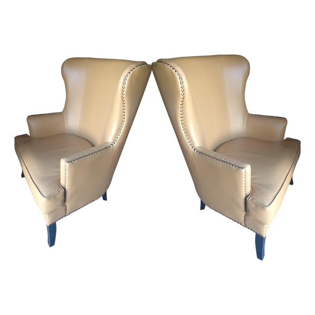 A Pair of Elegant Mid-Century Leather Butterfly Wingback Chairs by Williams-Sonoma. For Sale