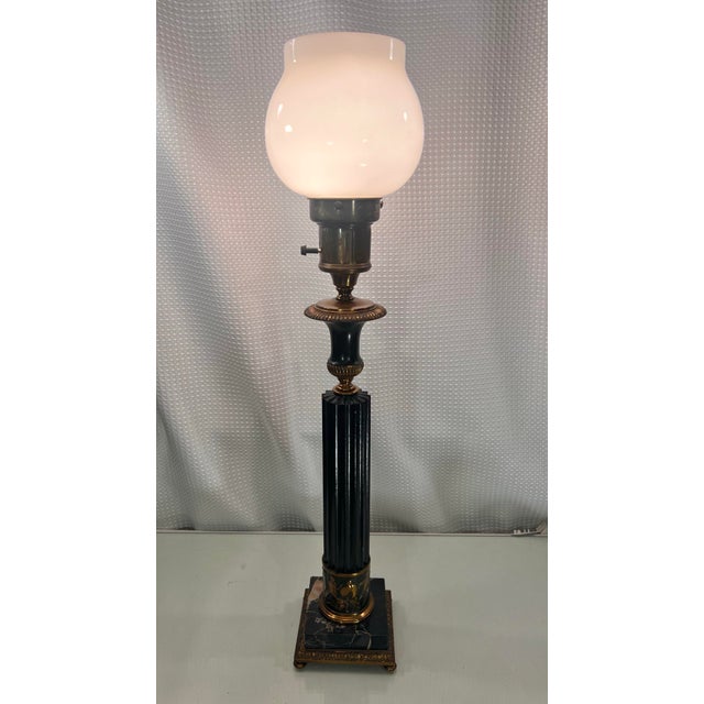 Introducing the exquisite Mid-Century Crest Co Neoclassical Patinated Bronze Fluted Column Table Lamp! This stunning...