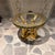 For your consideration, a hollywood regency glass-topped side table features an ornate, gold-leafed base with scrolled...