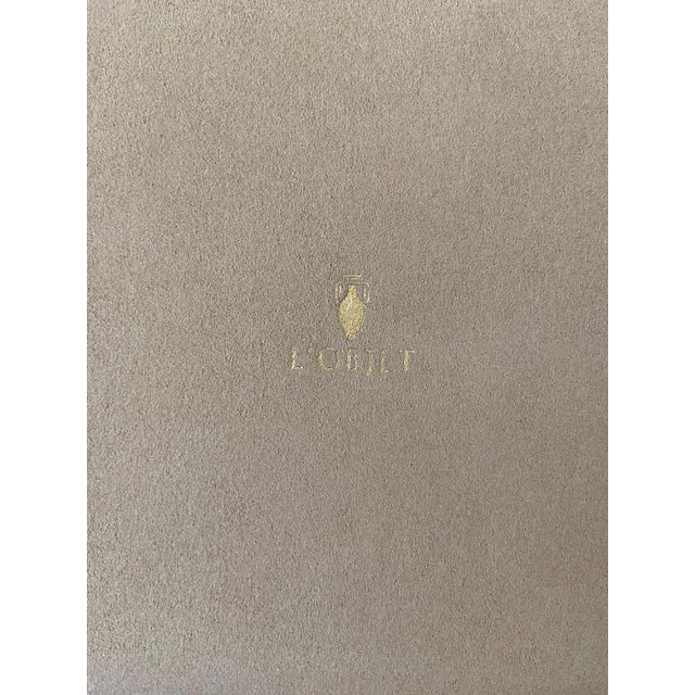 A striking sculptural object from L’Objet, this 24K gold‑plated porcelain Pyramid Box brings modern geometry and luxurious...