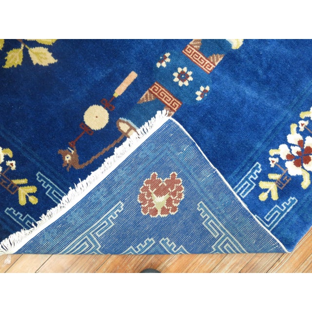 An intermediate size one of a kind blue Chinese rug from the 3rd quarter of the 20th century. Measuring 5'4'' x 7'6'