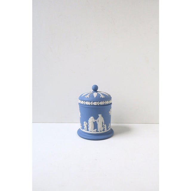 A beautiful English blue and white Jasperware box, in the Neoclassical Style, by Wedgwood, England, 1968. Box is blue and...