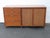 This magnificent Sideboard is made of wood, solid wood, cherry, walnut, veneer, and caning. This Sideboard was made by...