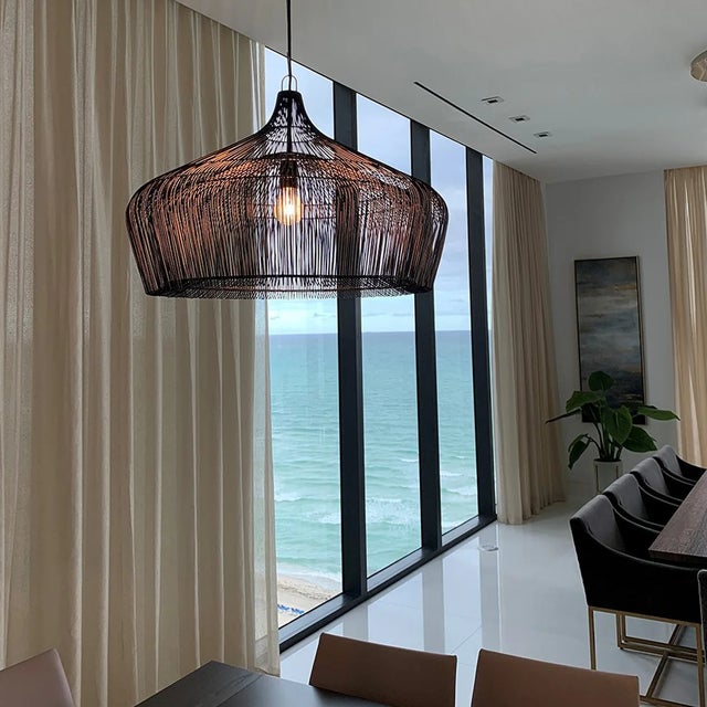 Designed by Ed Van Veldhoven, the Moire pendant is hand-woven by skilled artisans from galvanized iron wire, a malleable...