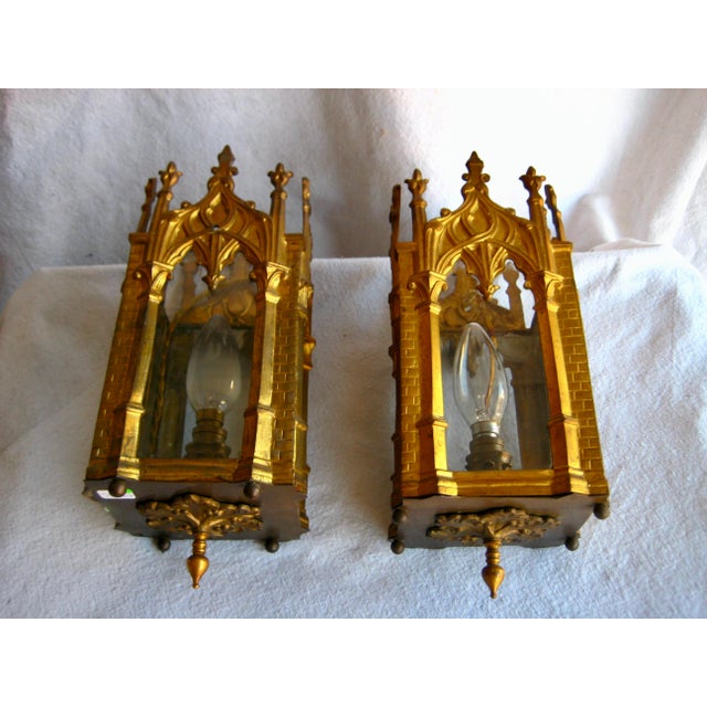Unusual and rare this beautiful pair of sconces are in the Neo-Gothic style , and really give the feeling they are like...